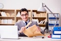 The businessman receiving letter envelope in office