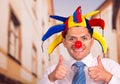 Businessman with a red clown nose Royalty Free Stock Photo