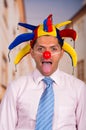 Businessman with a red clown nose Royalty Free Stock Photo