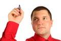 Businessman in red shirt with pen in hand Royalty Free Stock Photo