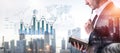 Businessman Analyzing Data with Financial Charts and City Skyline in Background Reflecting Modern Economy and Market Royalty Free Stock Photo