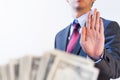 Businessman refuses to receive money - no bribery and corruption Royalty Free Stock Photo