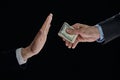 Businessman refusing money offered. Human hands rejecting an offer of money Royalty Free Stock Photo