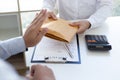 Businessman refusing to receive the money in a brown envelope to sign a business contract Royalty Free Stock Photo