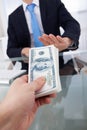 Businessman refusing to take bribe from man Royalty Free Stock Photo