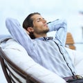 Businessman relaxing in a comfortable chair Royalty Free Stock Photo