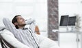 Businessman relaxing in a comfortable chair Royalty Free Stock Photo