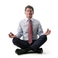 Businessman relaxing and doing yoga Royalty Free Stock Photo