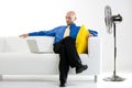 Businessman Relaxing With Fan Royalty Free Stock Photo