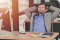 businessman relaxing rest nap at office desk Royalty Free Stock Photo