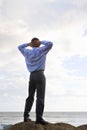 Businessman relaxing at the sea Royalty Free Stock Photo