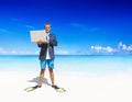 Businessman relaxing on a Tropical Beach Royalty Free Stock Photo