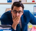 Businessman with reminder notes in multitasking concept