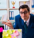 Businessman with reminder notes in multitasking concept