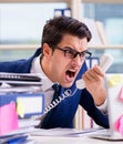 Businessman with reminder notes in multitasking concept