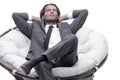 Businessman resting in a comfortable chair