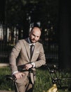 Businessman riding bicycle to work Royalty Free Stock Photo