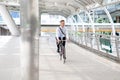 Businessman riding bicycle to work on urban street in morning .transport and healthy Royalty Free Stock Photo