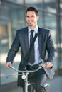 Businessman riding a bicycle to work