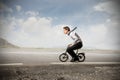 Businessman riding a bike