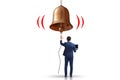 Businessman ringing the bell in case of danger