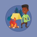 Businessman roasting marshmallow over campfire.