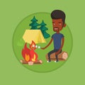 Businessman roasting marshmallow over campfire.