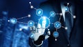 Futuristic Businessman Interacting with Digital Network Interface in Financial District, Showcasing Innovation in Royalty Free Stock Photo