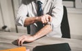 Businessman rolling up his sleeves Royalty Free Stock Photo