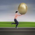 Businessman run with gold egg on track field Royalty Free Stock Photo