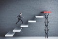 Businessman runing on stairs to success