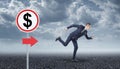 Businessman running on asphalt and road sign with dollar Royalty Free Stock Photo