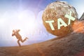 Businessman running away in tax concept