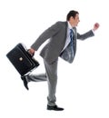 Businessman running with a briefcase Royalty Free Stock Photo