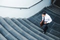 Businessman running fast upstairs Growth up Success concept Royalty Free Stock Photo