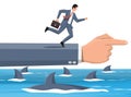 Businessman running on hand over shark in water.