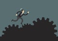 Businessman running on the rocky path making up of gears. Concept of motivation, overcoming risk, challenge or corporate problem. Royalty Free Stock Photo