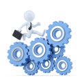 Businessman running on top of the gear mechanism. Business concept. Contains clipping path
