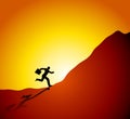 Businessman Running Up Mountain