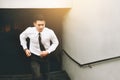 Businessman running up stairway going to work. Royalty Free Stock Photo