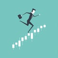 Businessman running upwards on a business graph, Jumping in the stock market.