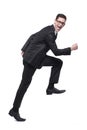 Businessman runs in black suit on white. Royalty Free Stock Photo