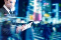 Businessman at rush hour walking in the city street Royalty Free Stock Photo