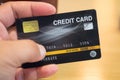 Businessman`s hand holding credit cards Royalty Free Stock Photo