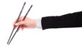 Businessman's hand Holding Chopsticks Royalty Free Stock Photo