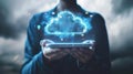 Businessman\'s hand holding digital tablet with cloud data graphic Royalty Free Stock Photo
