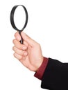 Businessman's hand holding magnifying glass Royalty Free Stock Photo
