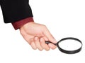 Businessman's hand holding magnifying glass Royalty Free Stock Photo