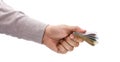 Businessman`s hand offering Brazilian money wad, concept of payment or government aid Royalty Free Stock Photo