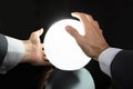 Businessman`s Hand Predicting Future With Crystal Ball Royalty Free Stock Photo